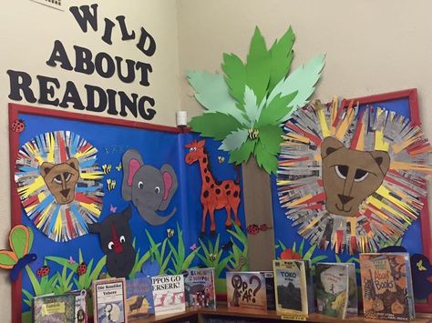 Children's library display, Wild animals display, Wild about reading display Wild About Reading Bulletin Boards, Wild About Reading Theme, Reading Corner Bedroom, Jungle Theme Classroom Decorations, Wild About Reading, Safari Theme Classroom, Dinosaur Classroom, School Book Fair, Jungle Classroom