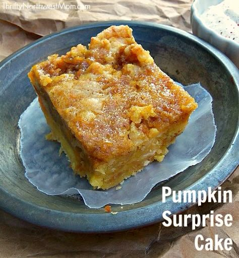 Pumpkin Surprise Cake I don’t know about you but one of my favorite parts of the fall season are all the yummy pumpkin dishes! And this is one of our favorites that I got from my sweet neighbor Marcia a number of years ago. It’s called Pumpkin Surprise Cake! It’s so easy to make & … Pumpkin Spice Bread Recipe, Spice Bread Recipe, Surprise Dessert, Punch Bowl Cake Recipe, Punch Bowl Cake, Easy Pumpkin Recipes, Moist Bread, Thanksgiving Goodies, Pumpkin Spice Bread