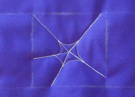 How to Free-motion Quilt a Spider Web | WeAllSew Spider Web Free Motion Quilting, Spiderweb Quilting Design, Spider Web Quilting, How To Make Spiders, Longarm Quilting Tutorials, Spooky Spider Web, Halloween Sewing Projects, Quilting Motifs, Halloween Spider Decorations