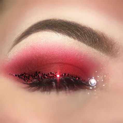 glittereyeliner red valentinesday glitter eyebrows makeup makeupideas eyeshadow Red Gem Makeup Rhinestones, Red Glitter Eyeliner, Red Eyeshadow With Rhinestones, Red Makeup Looks For Homecoming, Red Mermaid Makeup, Rhinestone Eye Makeup Simple, Red Rhinestone Makeup, Red Glitter Eye Makeup, Doja Concert