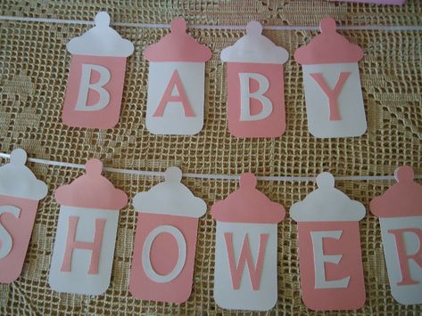 BABY SHOWER BUNTING Banner Flags Garland Pink White Baby Girl Bottles DIY - $8.73. Brides Babies Birthdays - Official eBay Store Home New Arrivals Add to Favourites Terms of Sale F.A.Q About Us Contact Us {tit} {cp} DESCRIPTION 10 stunning DIY baby bottles that Say "BABY SHOWER" with 2 meters of ribbon to match. This item comes to you un-assembled, the laser cut letters and bottle caps will need to be glued to the baby bottles. Each bottle comes to you in 3 pieces, bottle, letter, cap. Need it m Baby Bottle Diy, Diy Slinger, Bottles Diy, Baby Shower Bunting, Idee Babyshower, Diy Baby Shower Decorations, Baby Shower Deco, Baby Shower Crafts, Unisex Baby Shower