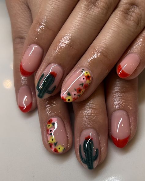 Some cute Cinco de Mayo themed nails! Something unique and easy to rock in the May month!! Love how these turned out. #manicure #nails #frenchnails #maynails #gelx #roundnails #redtips #cutenails #cincodemayo #nailinspo #beauty #thegelbottle #springnails #nailtrends #cactus #cactusnails #floralnails Fall Mexico Nails, Mexican Design Nail Art, Mexican Independence Nails, Mexico Holiday Nails, Texas Nail Ideas, Mexican Christmas Nails, Latin Nail Designs, Mexican Flag Nails Designs, Short Mexican Nails