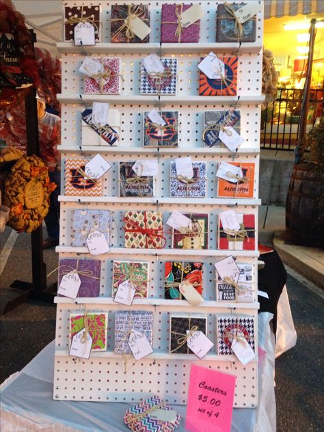 great way to display coasters. Now all I need to do is find a peg board!! Great Craft Stall Display Craft Stall Display, Craft Displays, Craft Fair Booth Display, Craft Show Booths, Stall Display, Rock Border, Greeting Card Display, Craft Market Display, Craft Show Booth