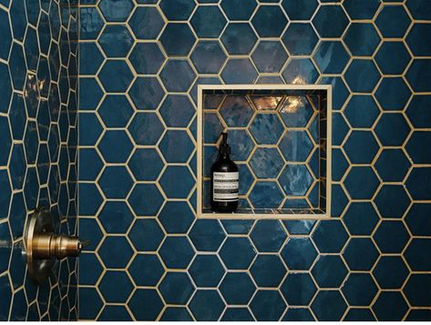 I never thought to use a gold/brass colored grout on a dark tile! The look is stunning! Tile With Brass Grout, Blue Tile Gold Grout, Black Tile Gold Grout, Kitchen Backsplash With Brown Cabinets, Gold Grout, Garage Suite, Gold Mosaic Tile, Hexagon Tile Bathroom, Colored Grout