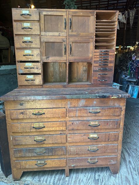 Beautiful handmade cabinet made in the early 1950's.. two pieces for easy moving. Drawers all open and close easily and are on metal drawer guides. Top right shelves and drawers are interchangeable.. drawers up top and shelves below, mix them up in a row, or leave as is with drawers on bottom. Solid back that was once barn siding with original orange paint...built for in a shop it has many open drawers and some smaller drawers have wooden dividers to keep your pieces organized. Some wear through Vintage Pantry, Old Tool Boxes, Handmade Cabinets, Industrial Cabinet, Barn Siding, Vintage Drawer, Shop Cabinets, Vintage Drawers, Vintage Industrial Furniture