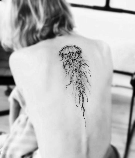 Jellyfish Spine Tattoos For Women, Jellyfish Tattoo Black And Grey, Sea Animal Spine Tattoo, Jellyfish Chest Tattoo, Jelly Fish Spine Tattoo, Jellyfish Tattoo On Back, Jellyfish With Flowers Tattoo, Jellyfish Shoulder Tattoo, Jellyfish Tattoo Back