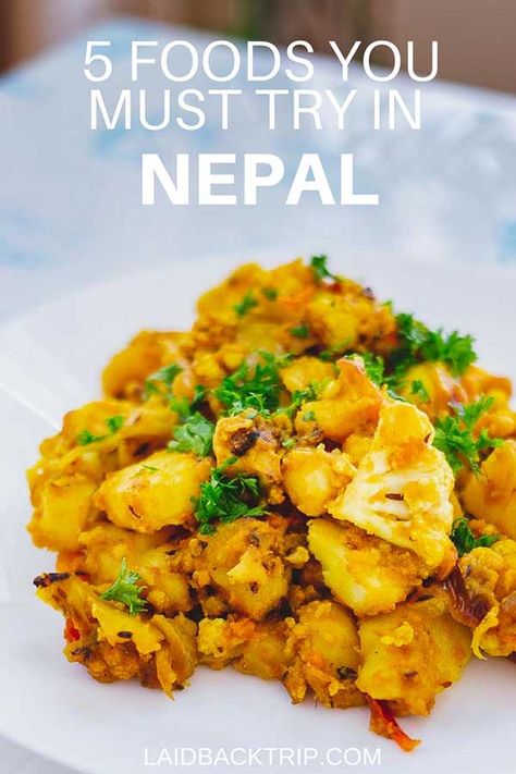 Nepal offers diverse variety of foods from traditional cuisine to popular international dishes. In this Nepal Food guide we're throwing our list of 5 most delicious and favorite Nepalese food at you that we had while trekking Annapurna Circuit and visiting Kathmandu and Pokhara | #food #nepalesefood #asianfood #nepal #cuisine Tibetan Food, Nepalese Food, Nepal Food, Nepali Food, Travel Nepal, International Dishes, Best Meals, Annapurna Circuit, Aloo Gobi