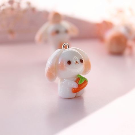 @sugarymilkdreams on Instagram: “Kawaii Bunny holding a Carrot🐰🥕🌸💫 this is a present that I crafted for a friend some time ago and send her by post as a little surprise🤗💖💫…” Diy For Bunny, Bunny Clay Charm, Cute Clay Bunny, Polymer Clay Charms Kawaii, Kawaii Clay Charms, Cute Clay Charms, Bunny Polymer Clay, Polymer Clay Bunny, Bunny Clay