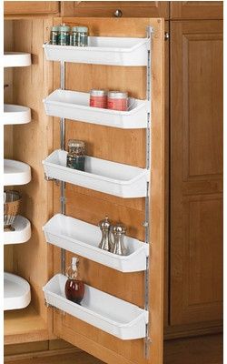 Simplify Your Organization: Hold your spices in places on a shelf mounted on the inside of your cabinet door. Good for RVs or your kitchen. - rugged life Adding Shelves In Camper, Boat Cabinet Storage, Wall Mounted Spice Cabinet With Door, Kitchen Storage Camper, Lazy Susan Storage Bins, Rv Cabinet Organizer, Lazy Susan Cabinet Bins, Pull Out Wall Storage, Spice Cabinet Lazy Susan