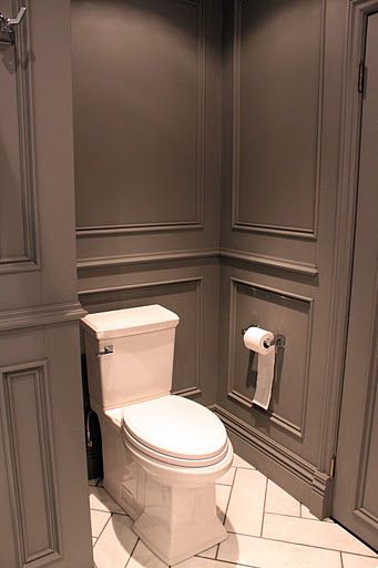 Stunning gray bathroom design features full wall gray wainscoting accented with gray moldings ... Grey Bathrooms Designs, Luxury Townhouse, Bathroom Walls, Small Farmhouse, Wall Molding, Painted Paneling, Grey Bathrooms, Wainscoting, Small Bathroom Remodel