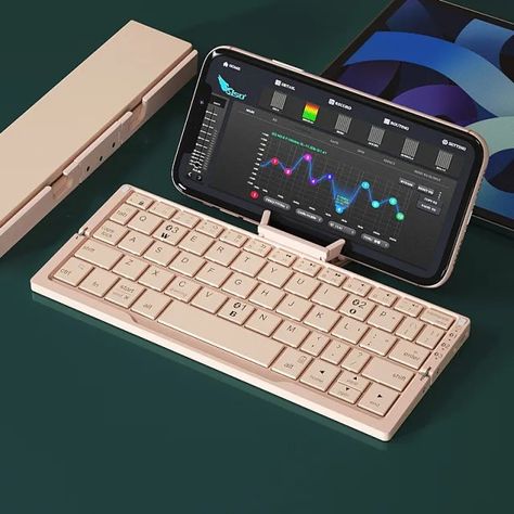 🌟 Introducing the Mini Folding Bluetooth Keyboard! 🌟 Take your productivity on the go with our compact, foldable keyboard. It's perfect for phones and tablets, and it connects via Bluetooth to up to 3 devices simultaneously. Plus, it comes with a handy stand for convenience! 🔹 Compact and portable 🔹 Supports 3 devices 🔹 Rechargeable and long-lasting 🔹 Perfect for work and travel Get yours now at Smile E Store and transform the way you work on your mobile devices! 📱💻 #portableproductivity #... Canvas Pillow, Bluetooth Keyboard, Bluetooth Device, Electrical Outlets, Operating System, Aruba, Tablet Laptop, Tech Gadgets, Costa Rica