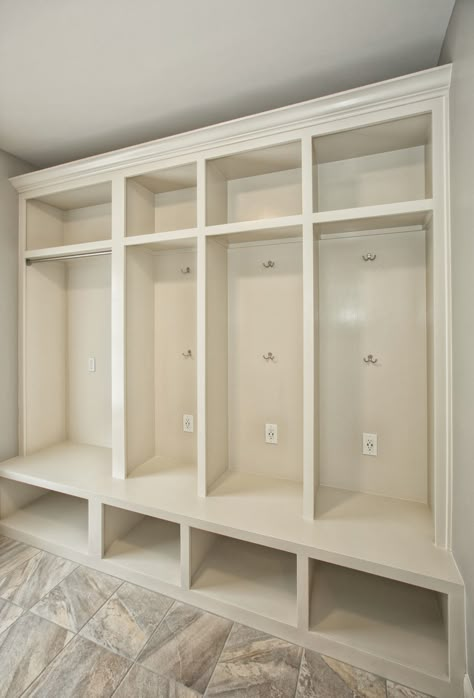 Mudroom cubbies with USB charging station in a laundry room remodel. Kids Mudroom, Kids Storage Bench, Mudroom Storage Bench, Mudroom Cubbies, Mud Room Entry, Mudroom Lockers, Room Storage Diy, Mudroom Laundry Room, Mud Room Storage