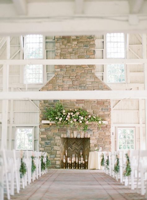 Candlelit and flower covered barn fireplace at Ashford Estate    see more:   Danielle and Kyle | Flutter Social    Planner: The Styled Bride  Photo: Rebecca Yale Ashford Estate Wedding, Barn Wedding Ceremony, Ashford Estate, Church Sanctuary, Blueberry Farm, Industrial Chic Wedding, Cool Wedding Ideas, Indoor Wedding Ceremonies, Altar Flowers