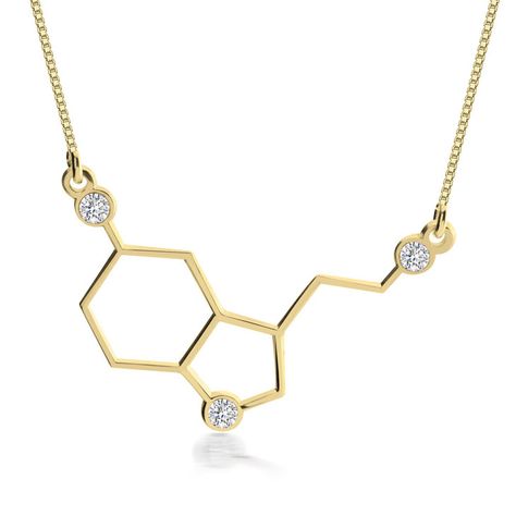 New! HoVV is proud to offer as part of our Exclusive Collection, the Serotonin Necklace which features a beautifully designed pendant shaped by the serotonin molecule, also known as the "happy chemical". The pendant is delicately crafted from high-quality sterling silver, ensuring durability and a brilliant shine. With its sleek and minimalist design, this necklace effortlessly complements any outfit, making it suitable for casual and formal occasions. #nurselife #mothersdaygift #jewelrydesig... Biology Lover, Melanie Marie, Serotonin Necklace, Serotonin Molecule, Molecule Necklace, Lover Necklace, Science Lover, Lovers Necklace, Turtle Necklace