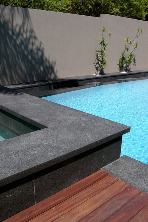 Charcoal Exfoliated Pool Coping Dark Pavers Around Pool, Dark Coping Around Pool, Black Pool Coping, Black Tile Pool, Stone Around Pool, Lap Pools Backyard, Pool Design Modern, Pool Surround, Deck Roof