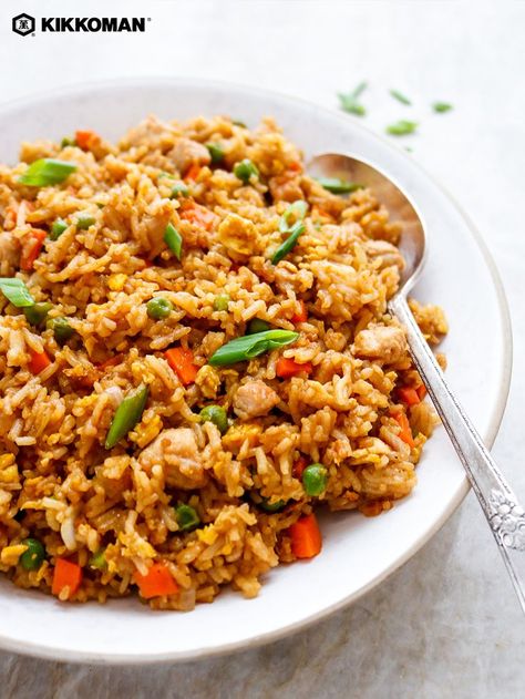 Hoisin Pork Fried Rice | For a quick meal any time, you can't go wrong with this delicious combo of pork chops and fried rice. With fall-apart meat and rice dressed with Kikkoman® Hoisin Sauce, this takeout recipe takes only 30 minutes to prepare. Great to make ahead for suppers all week, this easy dish can use up leftovers you have in the fridge for a budget-friendly meal. An easy weeknight dinner! Discover more home cooked takeout recipes at KikkomanCanada.com. #Kikkoman Hoisin Fried Rice, Fried Rice With Hoisin Sauce, Pork Chop Bites, Pork And Rice Recipes, Gluten Free Hoisin Sauce, Hoisin Pork, Takeout Recipes, Easy Fried Rice, Veggie Fried Rice