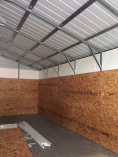 How To Insulate A Metal Building, Metal Building Insulation, Metal And Wood Bench, Building Insulation, Metal Shop Building, Garage Insulation, Roof Truss Design, Metal Building Designs, Steel Structure Buildings