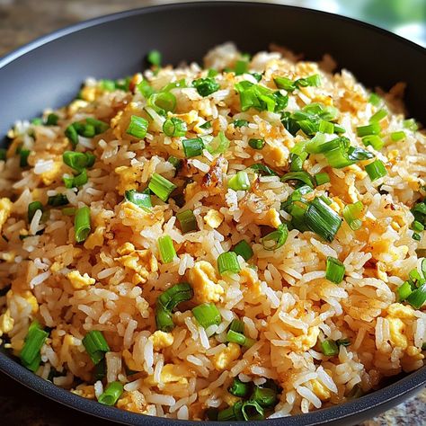 🦀 Elevate your fried rice with Aligue—crab fat adds a rich, seafood flavor that’s simply irresistible. 🍚🌟 #AligueRice #CrabFatRice Aligue Rice (Crab Fat Fried Rice) Ingredients: Cooked rice (3 cups) Crab fat (1/4 cup) Garlic (4 cloves, minced) Green onions (1/2 cup, chopped) Soy sauce (2 tbsp) Eggs (2, beaten) Instructions: Heat crab fat in a pan and sauté garlic until fragrant. Add cooked rice, soy sauce, and mix well. Push rice to one side, scramble eggs in the pan, then mix with rice. ... Fried Rice Ingredients, Scramble Eggs, Instagram Recipes, Cooked Rice, Rice Ingredients, Simply Irresistible, Trending Recipes, Scrambled Eggs, Wedding Food