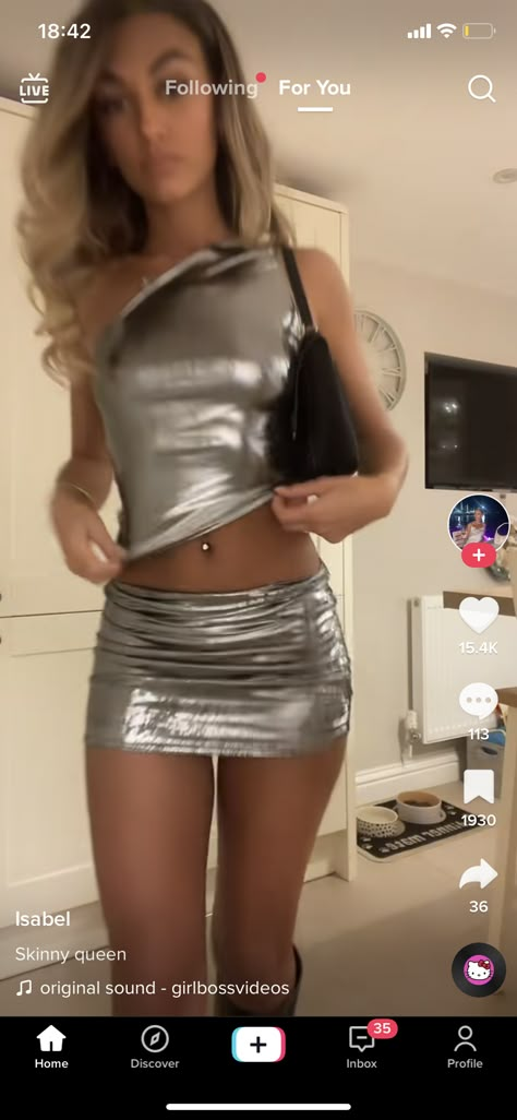 Silver Sparkly Mini Skirt, Silver Outfit Inspiration, Chrome Mini Skirt Outfit, Metallic Going Out Outfit, Metallic Clothes Aesthetic, Silver Metallic Outfits, Festival Outfit Sparkle, Metalic Outfits Festival, Silver Mini Skirt Outfit Metallic