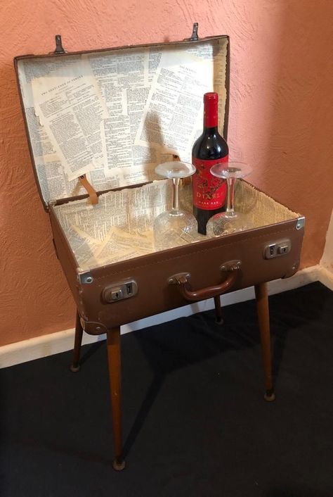 Brown vintage suitcase, made into a coffee table which opens up into a secret drinks cabinet. The suitcase has been lined with pages from some of Shakespeare's plays and houses a red bottle of Diablo red wine and glasses. Cute Suitcase, Suitcase Table, Cute Suitcases, Old Table, Shakespeare Plays, Vintage Suitcase, Drinks Cabinet, A Coffee, Super Cute