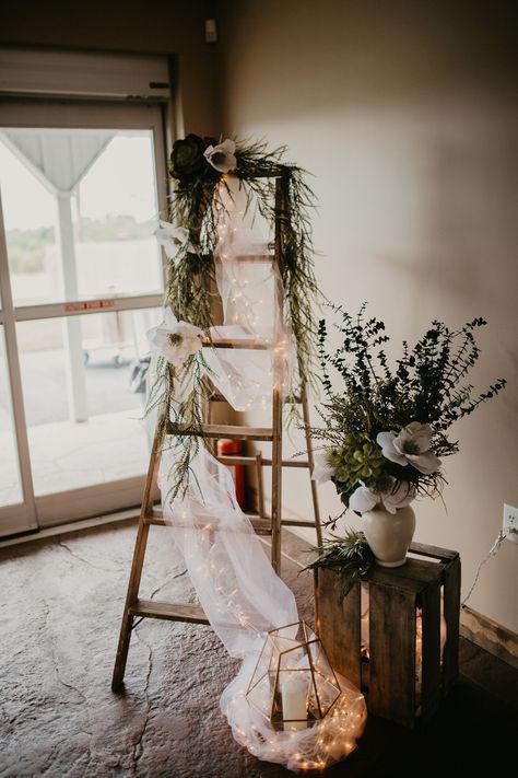 ladder wedding reception decor Venue: The Outpost Center | Photography: MV Photos Ladder At Wedding, Ladder Decorations For Wedding, Wooden Ladder Photo Shoot, Ladder Arch Wedding, Wedding Ladders Decoration, Rustic Ladder Decor Wedding, Ladder For Wedding Decor, Old Ladder Wedding Decor, Wooden Ladder Wedding Decor