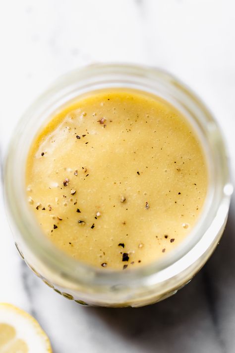 This All-Purpose Vinaigrette is aptly named since you can use it on pretty much anything: simple salads, roasted chicken, grilled veggies & more! Made with minimal pantry ingredients (like lemon & Dijon), each packing a punch of flavor, this all-purpose vinaigrette is easy to make, perfect for meal prep, & can be used on just about anything healthy! Get ready to fall in love! #playswellwithbutter #vinaigretterecipe #easyvinaigrette #healthyvinaigrette #saladrecipes #homamadesaladdressinggrecipe Minimal Pantry, Lemon Dijon Vinaigrette, Healthy Vinaigrette, Vinaigrette Recipes Easy, Simple Salads, Dijon Vinaigrette, Vinaigrette Salad, Simple Vinaigrette, Pantry Ingredients