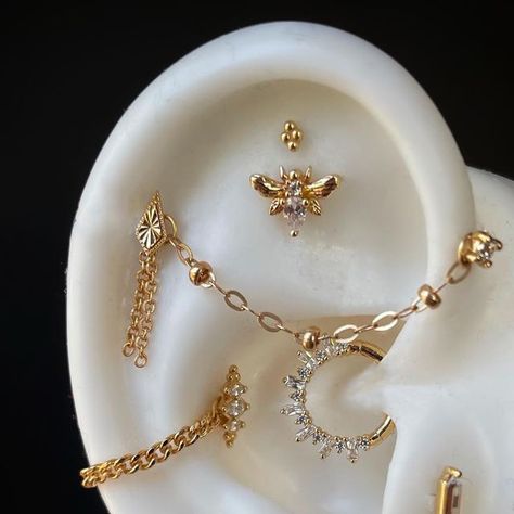 Gold Curated Ear Piercing, Ear Piercing Curation Gold, Ear Curation Gold, Gold Curated Ear, Ear Piercing Curation, Gold Piercings, Ear Curation, Unique Ear Piercings, Dope Jewelry Accessories