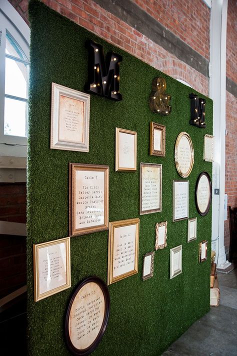 How fake grass and picture frames created the most kick-ass seating chart Fake Grass Decor, Decorations On A Budget, Grass Backdrops, Wedding Decorations On A Budget, Grass Wall, Grass Decor, Fake Grass, Grass Wedding, Wall Seating