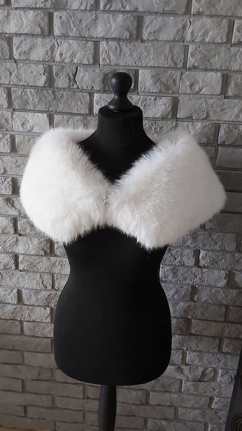 The bridal étola is made of white high-quality artificial fox, the fur is very soft and fluffy, the hair is springy and does not crease. The étola is finished with a satin lining. Fastened with a decorative hook and eye fastener. Universal size Etola is collar-shaped with a length of 125cm , the widest point 25cm. If you require a larger collar please email me. You are cordially invited. White Fur Lined Dress, Fluffy Winter Dress, Horror Bunny, White Fur Jacket, Fur Outfit, Prom Dress Pictures, Faux Fur Shawl, Fur Shrug, Wedding Fur