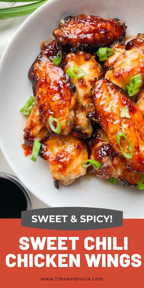 Sweet and spicy! These baked chicken wings are the best of both worlds. Adjust the heat to your level and don't forget the napkins! Sweet Heat Chicken Wings, Sweet Chili Chicken Wings Baked, Sweet Heat Wing Sauce, Sweet Chili Wing Sauce, Sweet Chili Wings Recipe, Sweet And Spicy Chicken Wings, Sweet Chili Sauce Chicken, Chili Chicken Wings, Sweet Chili Chicken Wings