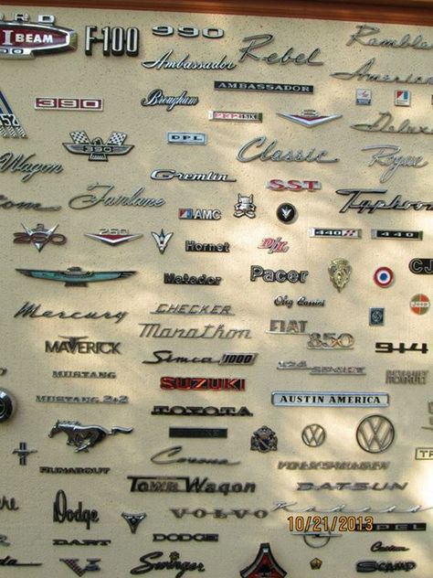 I want. 8' x 4' wall covered in car emblems. Memorabilia Wall, Mechanic Shop Decor, Car Themed Rooms, Old Car Parts, Car Bar, Cars Art, Commercial Display, Cool Garages, Car Deco