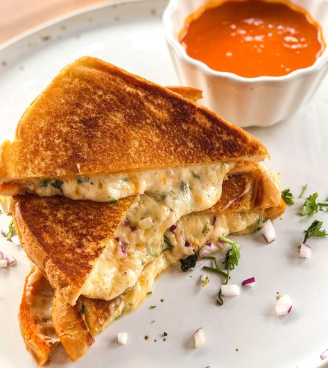 Cheese pull Masala Grilled Cheese — The Global Vegetarian Indian Grilled Cheese, Bagel Sandwich Vegetarian, Mumbai Sandwich, Hot Garlic Sauce, Cheese Pull, Cheese Bagels, Grilled Turkey, Bagel Sandwich, Sweet Chilli Sauce