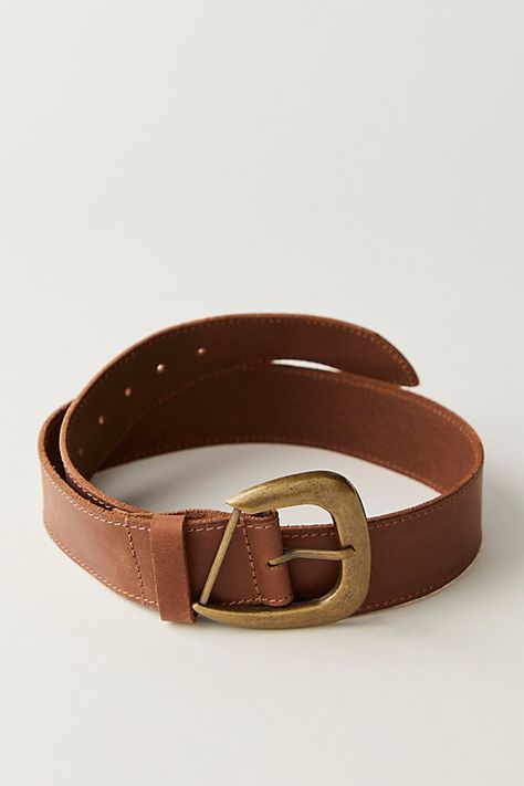 This sleek belt is a timeless accessory essential, featuring an oversized frame buckle and smooth leather fabrication for a chic look. **Features:** Smooth leather fabrication, medium width, tonal stitching, oversized frame buckle, tapered end, adjustable fit **Why We ❤ It:** Elevate basic ‘fits with this go-with-anything belt. | Charlie Leather Belt by Free People in Brown, Size: S/M Casual Belts Women, Chic Belt, Basic Fits, Brown Leather Belt, Clothing Stores, Timeless Accessories, Online Clothing Stores, Boho Clothing, Chic Look