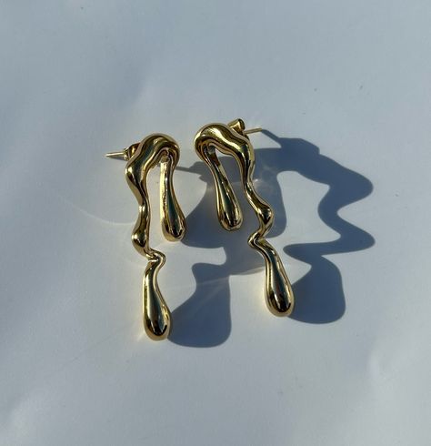 Lyric earrings 1500/= 18k gold plated Stainless steel material Available #s_cjewels #jewelryaddict Gold Statement Jewelry, Jewelry Product Shots, Asymmetrical Earrings, Minimal Jewelry, Jewelry Business, Accessories Store, Stainless Steel Material, Steel Material, Modern Jewelry