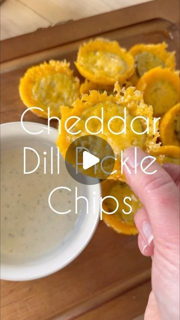 Ashlee Keene | DIY & Design on Instagram: "‼️ These melted cheddar dill pickle chips 👏🏻👏🏻👏🏻 Ok but can we imagine these with jalapeños too?! 😍 An easy snack and when I tell you to grate your own cheese, don’t skip this part! Freshly grated cheese is superior 🤌🏻
.
.
Ingredients
1.5 cups freshly shredded cheddar cheese
12 dill pickle chips
Ranch dressing
.
Get out a muffin tin and add freshly shredded cheddar cheese to each circle (enough to cover the bottom) 
Next, place your fill pickles on a paper towel and pat dry. Add a dill pickle slice on top of the cheese and cover with more cheese. Bake at 400° for 9 to 12 minutes or until the edges start to brown.
Remove from the oven and let cool for a couple minutes, then run a butter knife around the edges of the cheddar chips to take t Cheddar Cheese Wrap, Cheese Pickle Chips, Pickle Bites, Pickle Ideas, Cheddar Chips, Pickle Appetizers, Dill Pickle Slices, Dill Pickle Chips, Cheese Waffles