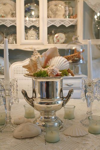 Champagne Bucket filled with Shells to create an Elegant Seaside Centerpiece by Cindy at "My Romantic Home". Bucket Centerpiece, Shell Centerpieces, Deco Marine, Seashell Decor, Art Coquillage, Champagne Bucket, She Sells Seashells, Champagne Buckets, Shell Decor