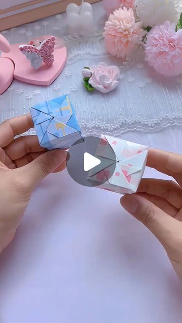 paper crafts creator on Instagram: "Title: "DIY Windmill Storage Box: Origami Tutorial for Secure Storage" Hashtags: 1. #OrigamiTutorial 2. #Origami 3. #LiddedStorageBox 4. #StorageBoxOrigami 5. #HandmadeOrigami" Paper Box Diy Videos, Box Origami Tutorial, Birthday Gift Box Origami, How To Make An Oragami Box Step By Step Video, Origami Storage Box Diy, Origami Hexagon Box Tutorials, Origami Strong Box Instructions, Origami Box Tutorial, Playing Card Box