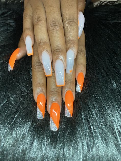 Neon orange nails with a Glitter acrylic cut. Soft white nails with a Orange outline and Orange heart 🧡 Orange And White Nail Designs, Orange Outline, Neon Orange Nails, Orange Acrylic Nails, Nails Orange, Brown Acrylic Nails, Natural Acrylic Nails, Orange Nail Designs, Orange Heart