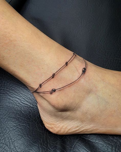 Anklet Tattoos Wrap Around, Friendship Bracelet Tattoo, Ankle Cuff Tattoo, Charm Anklet Tattoo, Braclet Tattoo, Bracelet Tattoo Ideas, Charm Bracelet Tattoo, Cuff Tattoo, Ankle Bracelet Tattoo