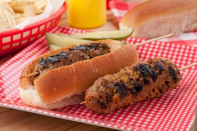 ​​​​﻿Hamburger "Hot Dog" | MrFood.com Hamburger Hotdogs, Meatloaf Burgers, Mr Food, Burger Dogs, Hot Dog Recipes, Picnic Food, Cooking On The Grill, Dog Recipes, Wrap Sandwiches