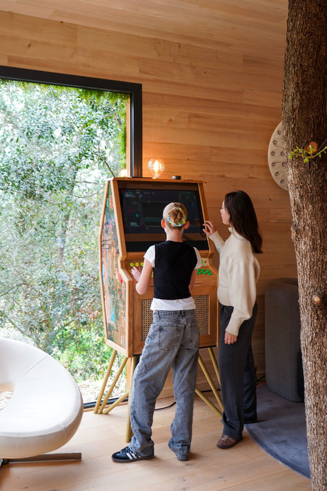 Wooden arcade cabinet in neutral wood living room with unique home decor. Arcade At Home, Arcade Interior, Luxury Arcade, Home Arcade, Arcade Cabinet, Retro Arcade, Arcade Game, Gaming Console, Story Inspiration