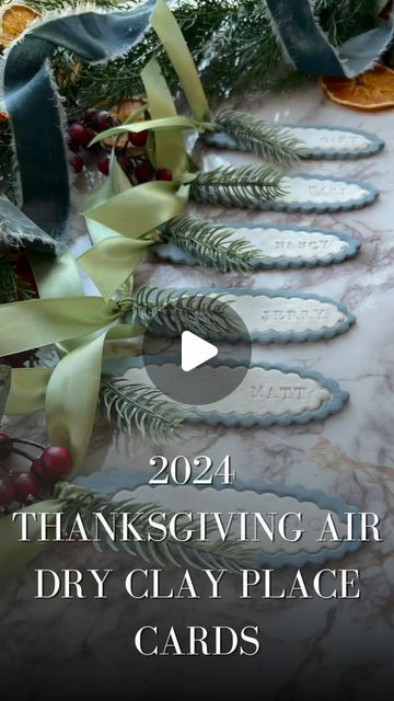 JESSICA PRETEROTI | Interior Design, Home DIY & Crafting on Instagram: "It’s time to reveal the design for my 2024 air dry clay Thanksgiving place cards! 🏷️   The place cards I made for last year’s Thanksgiving tablescape were such a huge hit and  everyone took them home to hang as Christmas ornaments and use as stocking tags too! 🎄  This year’s design features a sweet scalloped shape and pine sprig, and will add a fun, whimsical touch to my thanksgiving tablescape! 🦃   If you’re looking to create your own place card for your holiday festivities this year, both my 2023 and 2024 designs are now offered as ✨DIY Kits✨ that include all the supplies you need and a video tutorial to complete this easy DIY holiday gift! Just follow the link in my bio, or shop the link on this video! 🛍️   #tha Clay Place Cards, Christmas Place Cards Diy, Ornament Place Cards, Hygge Crafts, Thanksgiving Food Crafts, Wreath Party, Christmas Place Cards, Stocking Tags, Christmas Arts