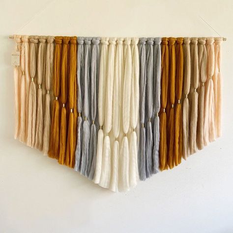 KEY DETAILS 
48"w x 1"d x 35"h. 
3 lbs. 
Wool, brass and wooden dowel. 
Hanging hardware included. 
Can only be hung horizontally. 
Sold individually. Brass Detail, West Elm Kids, Yarn Wall, Woven Wall Art, Yarn Wall Hanging, Handmade Wall Hanging, Mirror Wall Art, West Elm, Macrame Wall