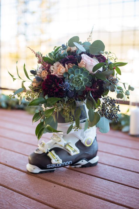 Weddings in the mountains mean ski boots are out. #MountainWeddings #FlowerSkiBoot #PetalandBean #WinterWeddings Ski Boot Decor Ideas, Ski Theme Wedding Ideas, Ski Themed Wedding Decor, Mountain Themed Wedding Centerpieces, Ski Chalet Wedding, Ski Centerpieces, Ski Wedding Theme, Ski Lodge Wedding Winter, Ski Baby Shower Ideas