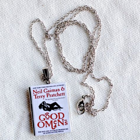 Good Omens , Terry Prachet, Neil Geiman, Aziraphale Book Locket Good Omens Merchandise, Good Omens Jewelry, Terry Prachet, Geeky Clothes, Sci Fi Fashion, Good Omens Book, Book Locket, Beloved Book, Fandom Outfits