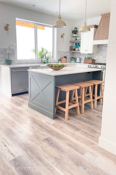 Why We Chose Vinyl Plank Flooring for Our New Build Home | The Happy Housie House Ideas Farmhouse, Modern Farmhouse Style Kitchen, Modern Coastal Farmhouse, Grey Kitchen Island, Coastal Farmhouse Decor, Gray And White Kitchen, Kitchen Finishes, Home Decor Blue, Gothic Ideas