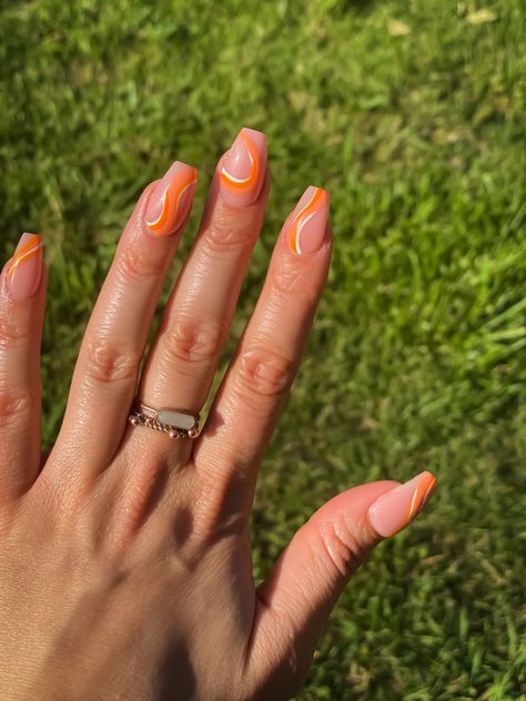 swirly orange nail inspo for a sublte but cute, sping or summer look 🧡✨ Orange Swirly Nails, Orange Festival Nails, Orange Nails For Prom, Gel Nail Designs Orange, Orange Nail Inspo Acrylic, Orange Hoco Nails, Neon Orange Nails With Design, Orange Design Nails, Neon Orange Nail Ideas