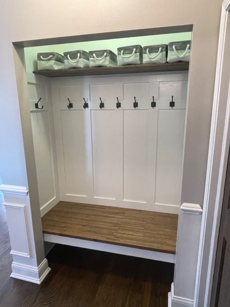 A classy conversion of our coat closet into a bench with coat hooks Hall Closet Conversion, Closet Turned Hall Tree, Entry Coat Closet Makeover, Hall Closet To Mudroom Convert, Entry Closet To Mudroom Convert, Entry Coat Closet, Converting Coat Closet To Mudroom, Foyer Closet Makeover, Convert Front Closet To Mudroom