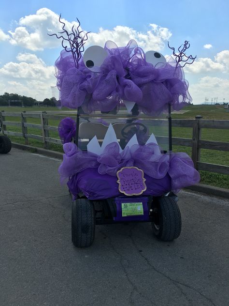 Purple People Eater Golf Cart Decorating Golf Cart For Halloween, Decorating Golf Carts Ideas, Golfcart Decorations Halloween, Halloween Golf Cart Decorations Ideas, Witches Ride Golf Cart, Halloween Golf Cart Parade, Decorated Golf Cart Ideas Halloween, Golf Cart Halloween Decorations, Golf Cart Parade Ideas