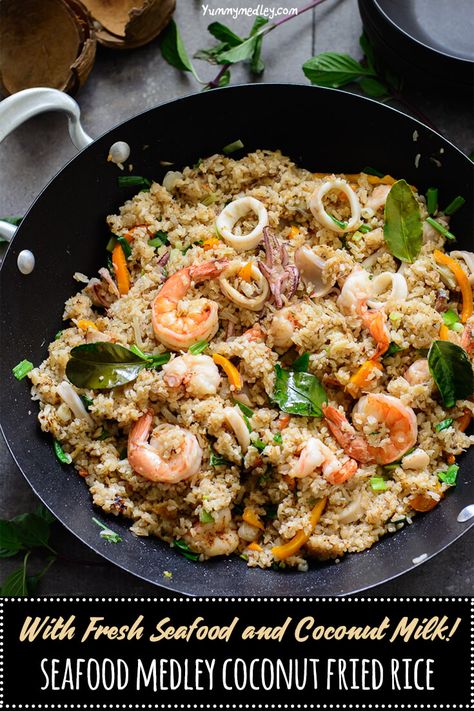 This Seafood Medley Coconut Fried Rice recipe also known in Nigeria as fisherman's rice is a delicious  Nigerian coconut fried rice made with fresh coconut milk and fresh seafood medley of shrimp, calamari and crabs from the day's catch. via @yummymedley Seafood Medley Recipes, Seafood Rice Recipe, Coconut Fried Rice, Seafood Fried Rice, Seafood Medley, Seafood Rice, Seafood Mix, Fried Rice Recipe, Fresh Seafood